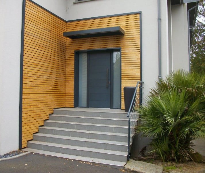 Portail, marquise, bardage, dessous de toit et store-banne réalisés à GRANVILLE